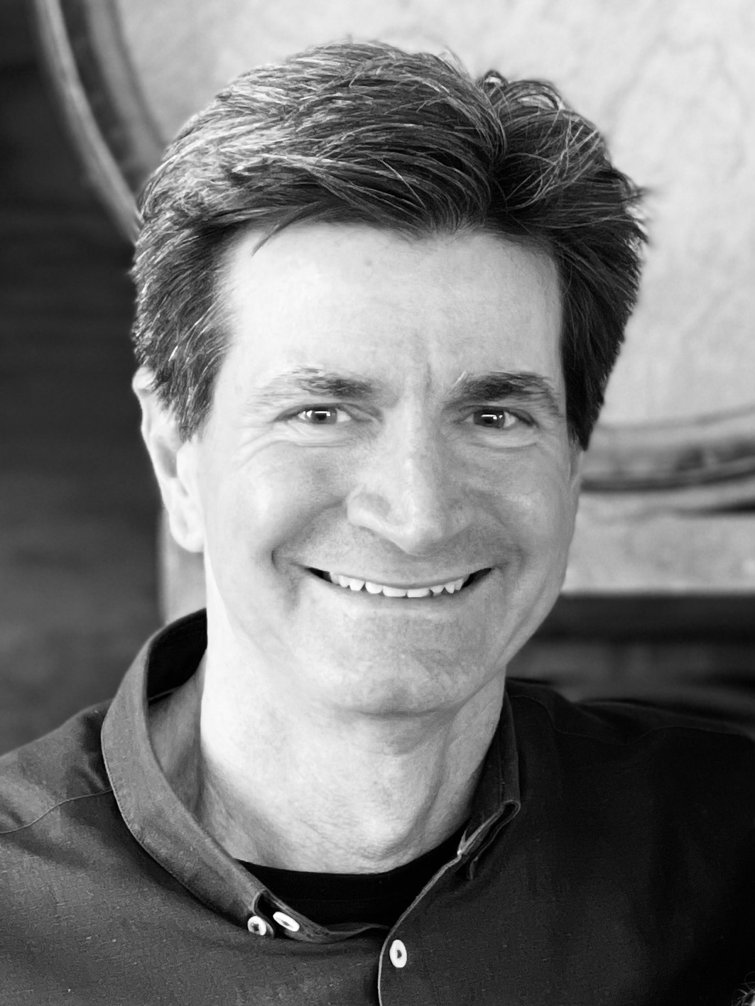 Black and white headshot photo of Howard Spry